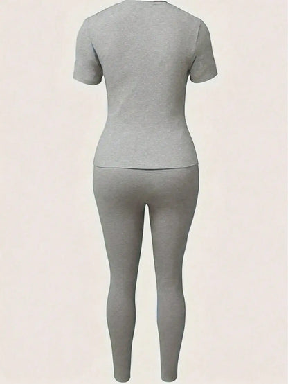 2026 Women's New Paris Printed Two-Piece Set, Casual Short-Sleeved Round Neck T-Shirt and Tight Pants Long Pants Set