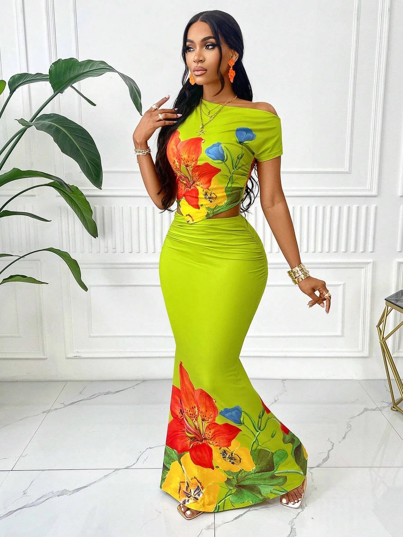 Elegant Women's Summer Fashion Two-piece Set: Bright Floral Print Sleeveless Top and Casual Resort Extra-long Skirt Beachwear